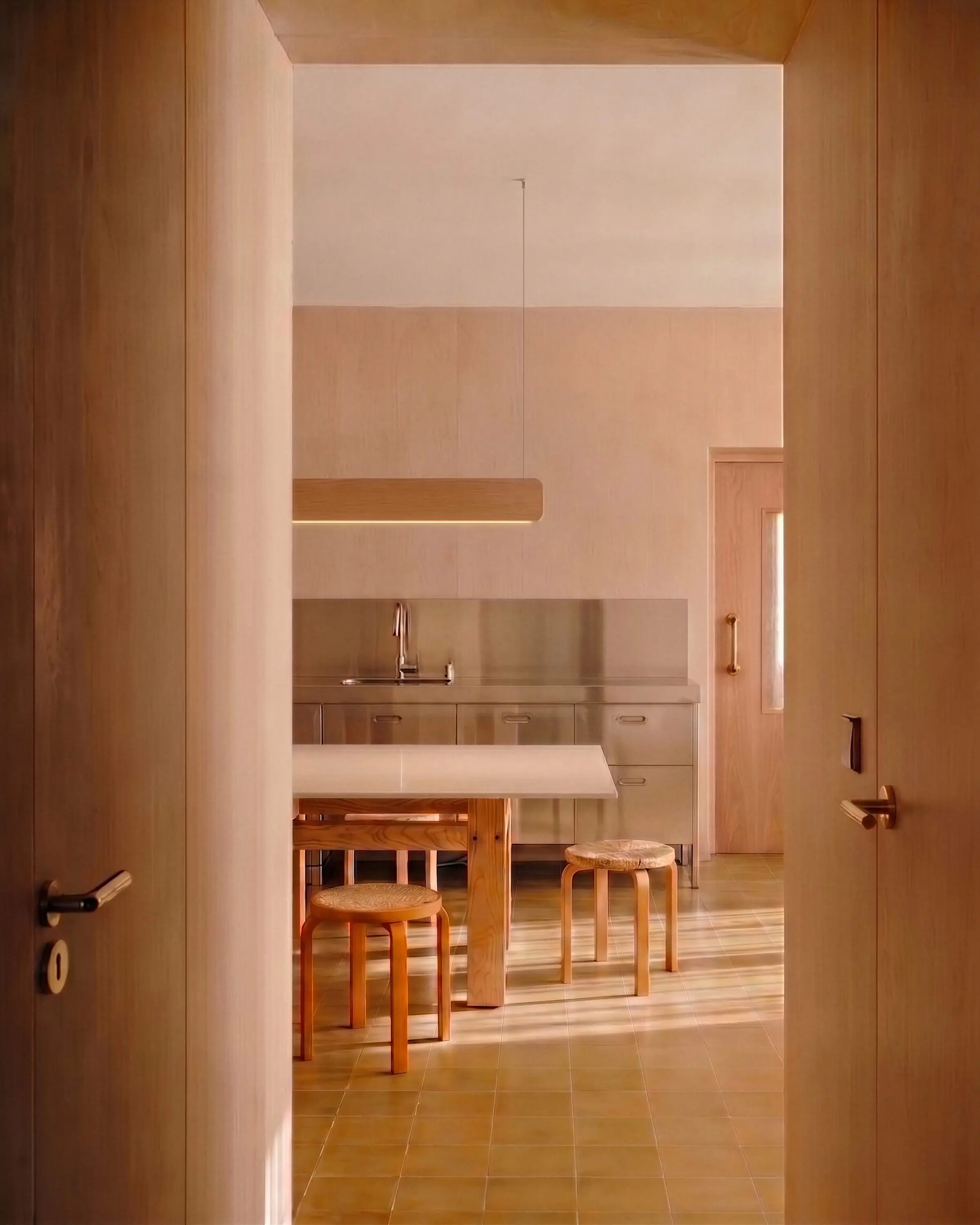 Singular Lighting - NINA Pendant P120-17 Minimalist wooden hanging lamp complementing light oak wall panels and a stainless steel kitchen counter