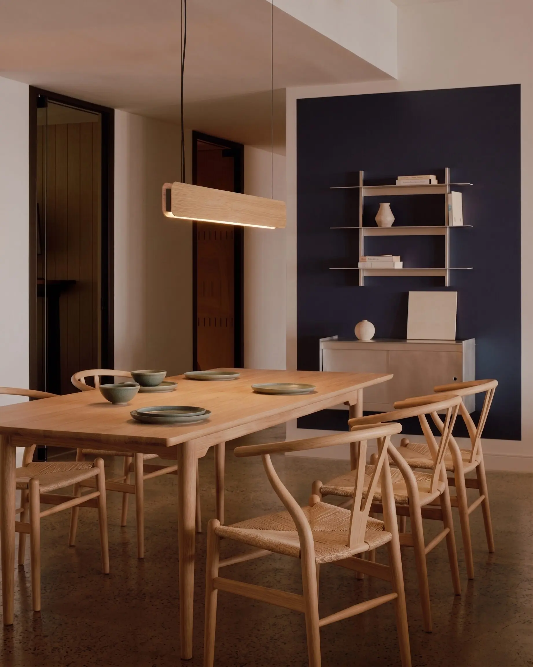 Singular Lighting - NINA Pendant P120-20 Modern linear wooden suspension lamp illuminating a dining area in a cabin with high ceilings and forest views