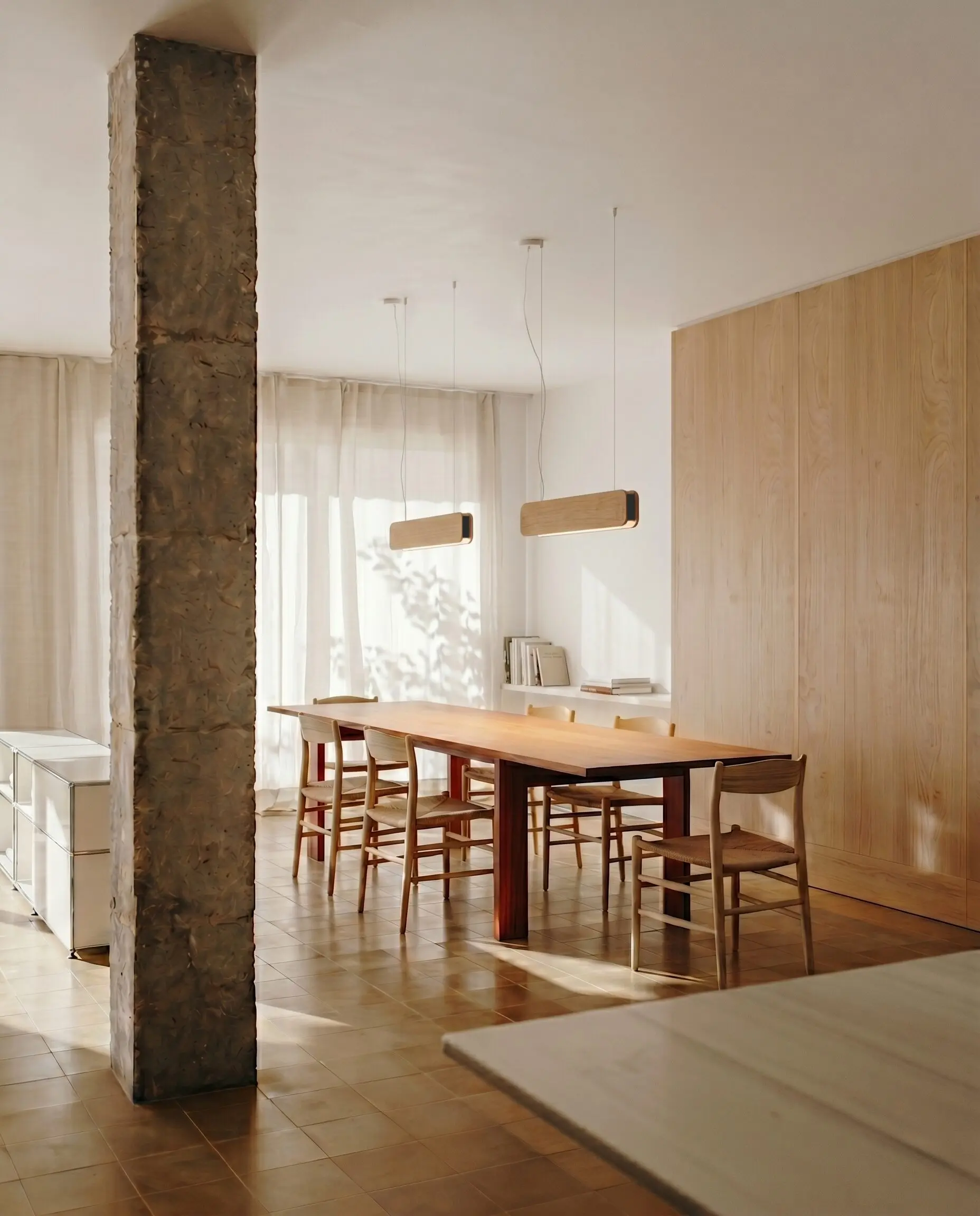 Singular Lighting - NINA Pendant P68-02 Warm LED light from a linear wooden pendant lamp contrasting with dark modern kitchen cabinetry